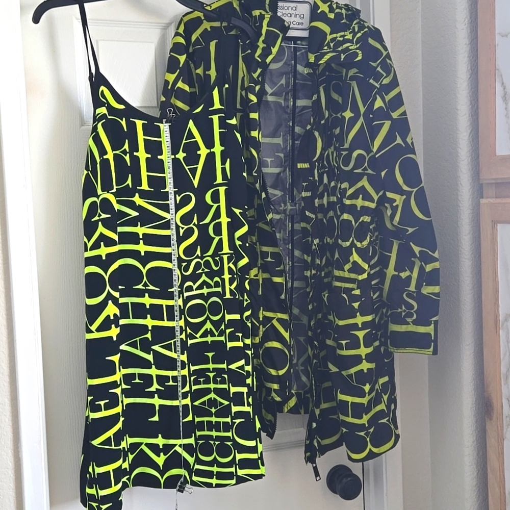 Michael Kors dress a must-have matching coat available sold seprately.